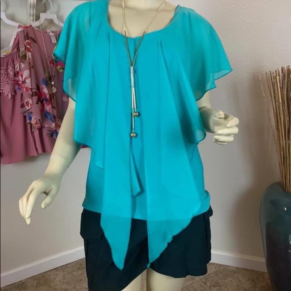 Blue  blouse with necklace